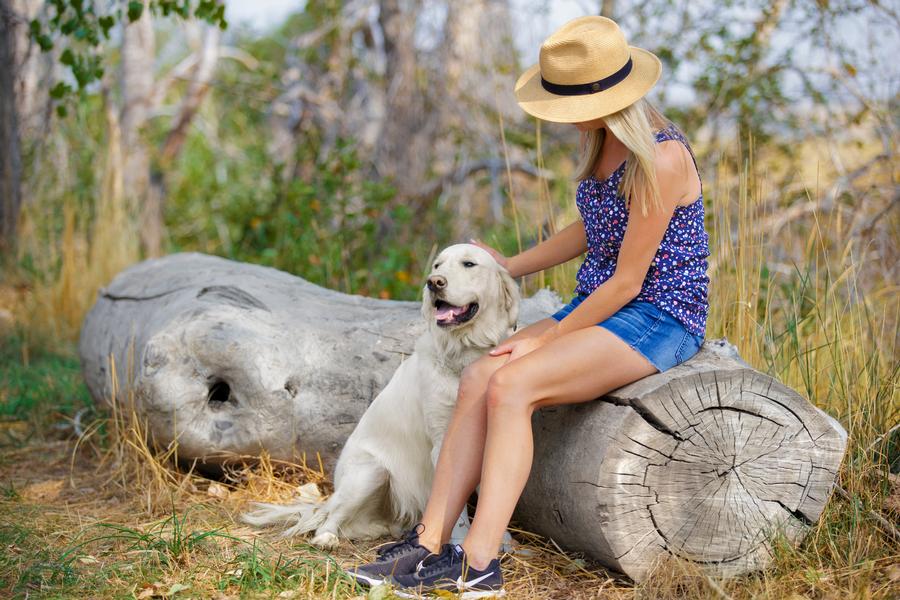 Solstice_Lifestyle_Summer_Dog_Woman_Log.jpg