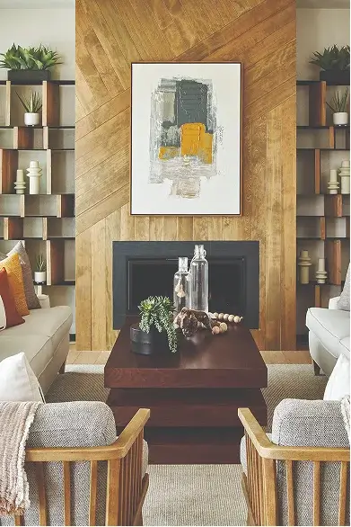 Modern living room with wood accent wall and fireplace